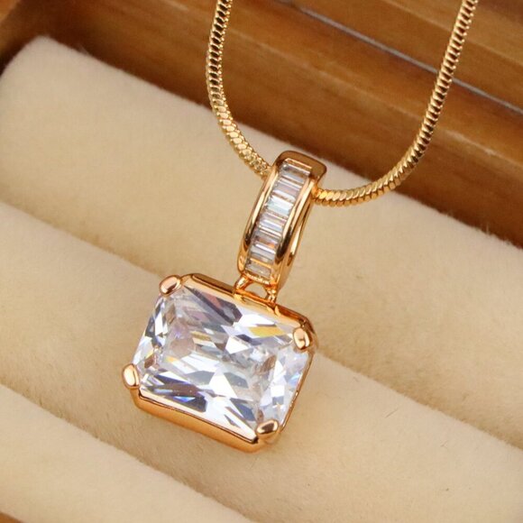 "Elegant White Stone Pendant in Gold Finish with Baguette Detailing, XPPT1777 - Picture 1 of 13